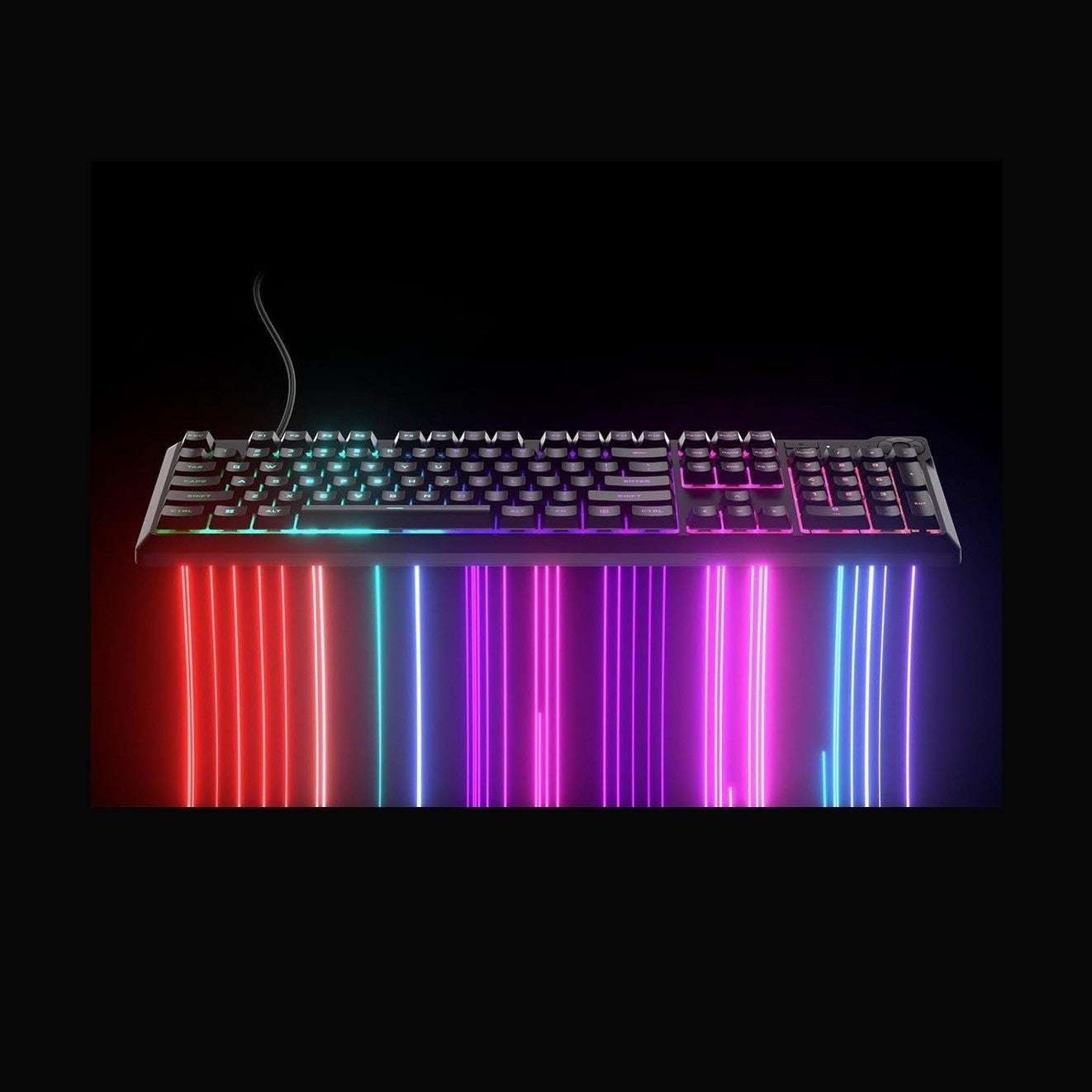 Black Corsair K55 CORE RGB keyboard showing vivid rainbow lighting across the keys