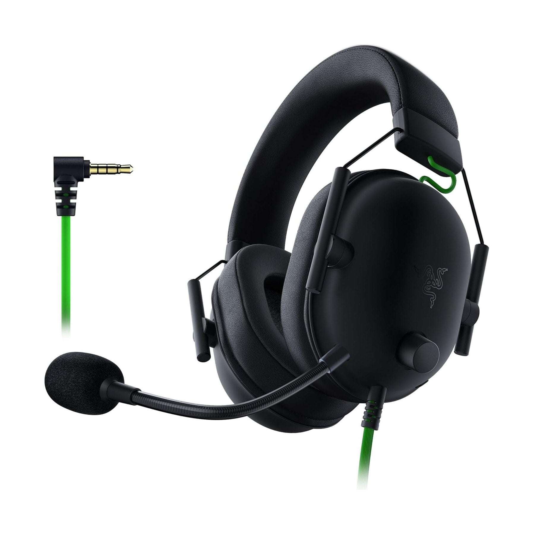 Black over-ear gaming headset with padded earcups, boom mic, and green cable accents